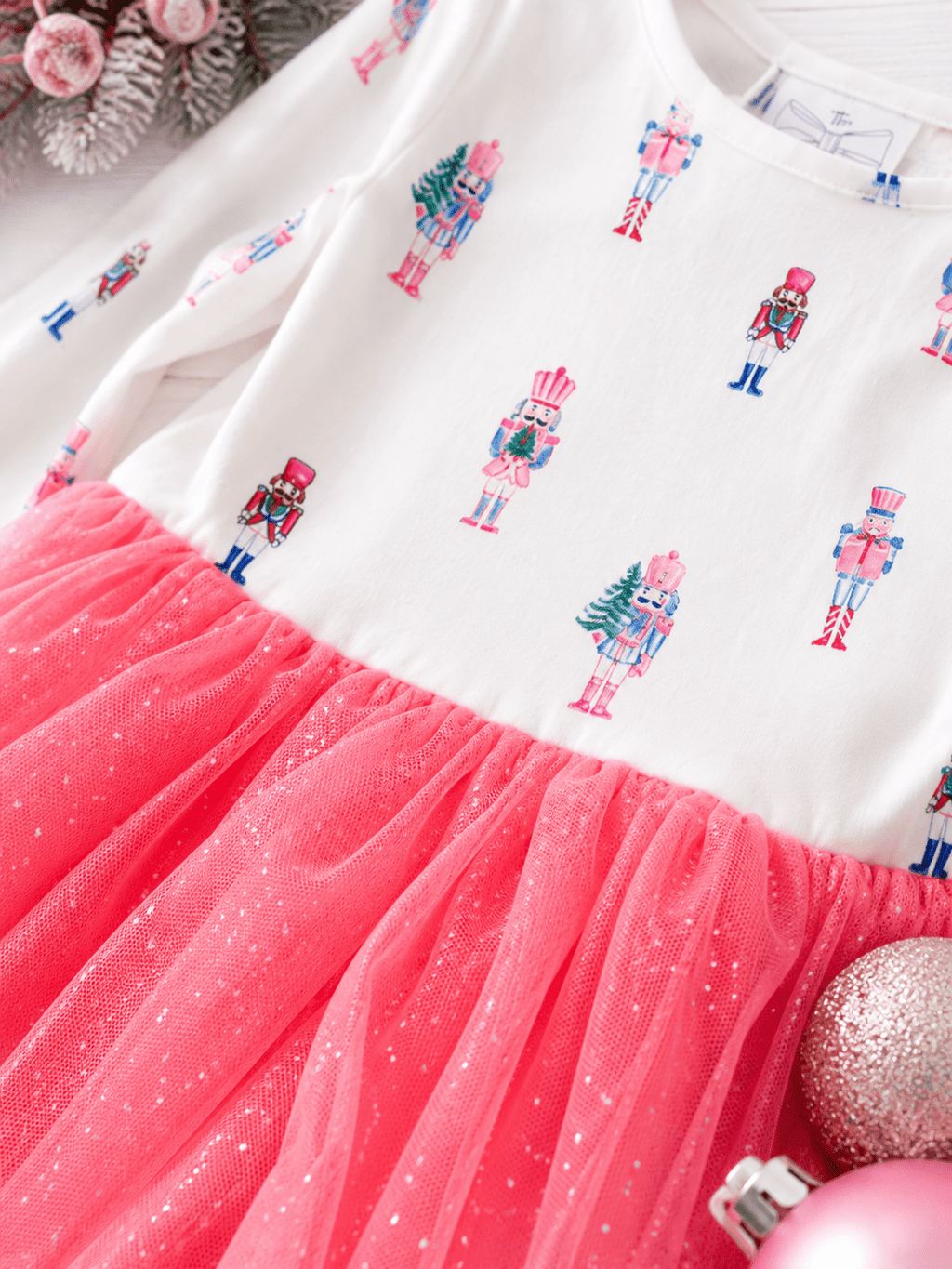 Close-up of The Nutcracker Twirl Dress nutcracker print and shimmer tulle