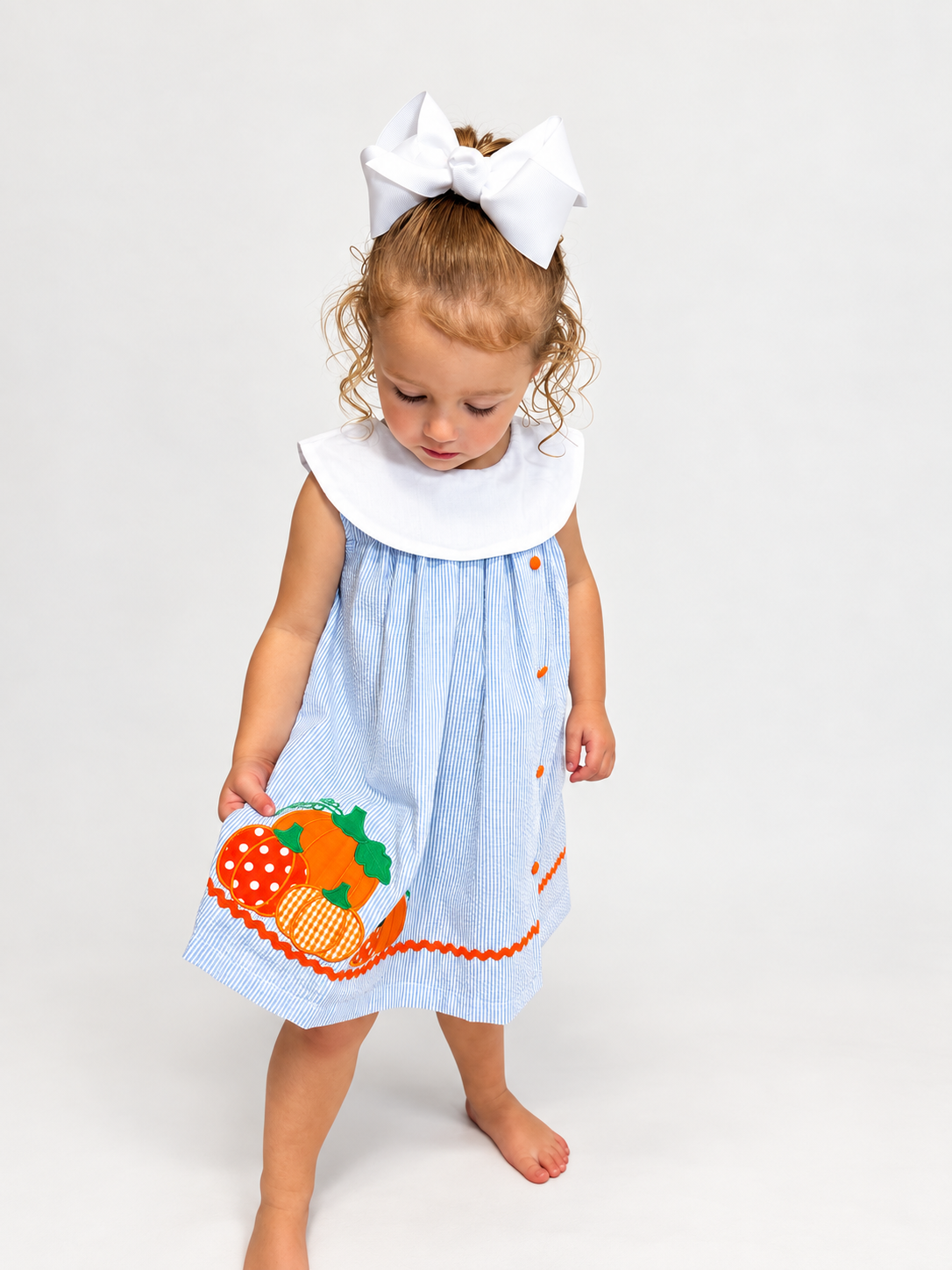 Girl in The Pumpkin Patch Dress walking