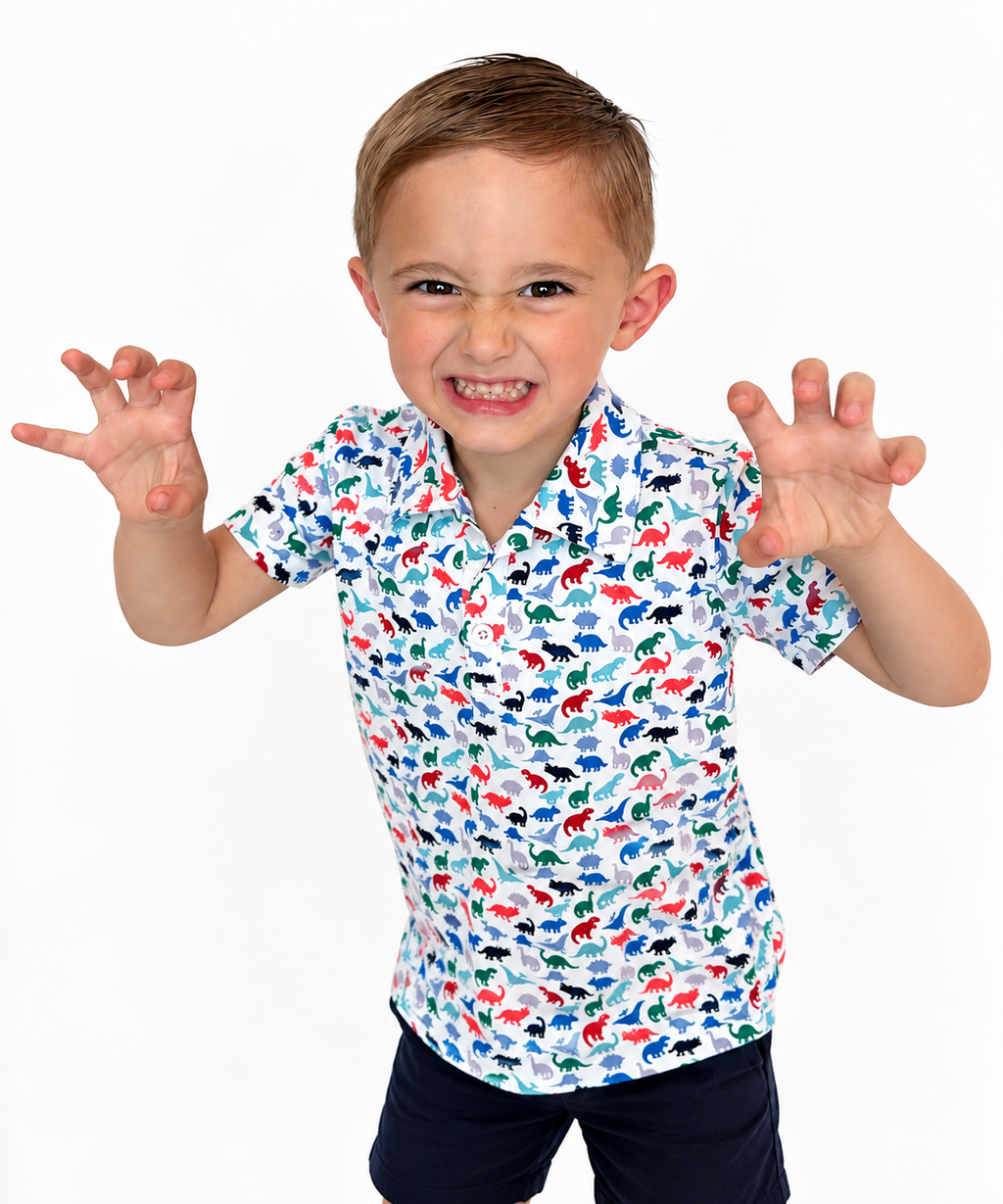 Boy in The Little Roar Polo making a dinosaur roar