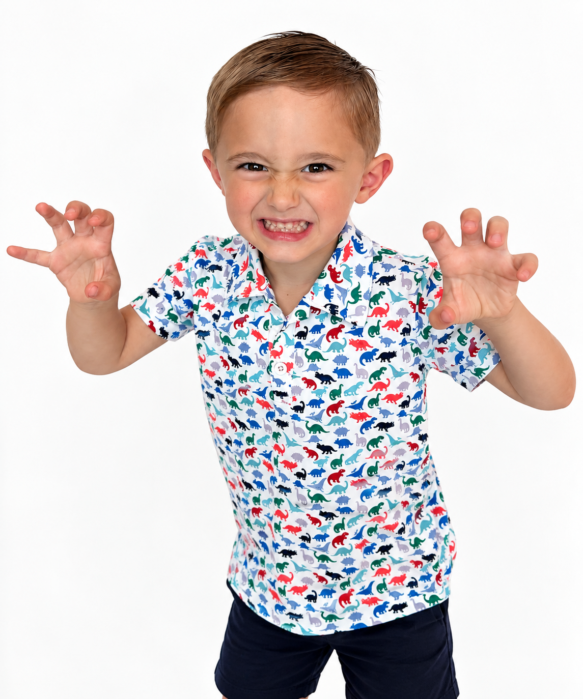 Boy in The Little Roar Polo making a dinosaur roar