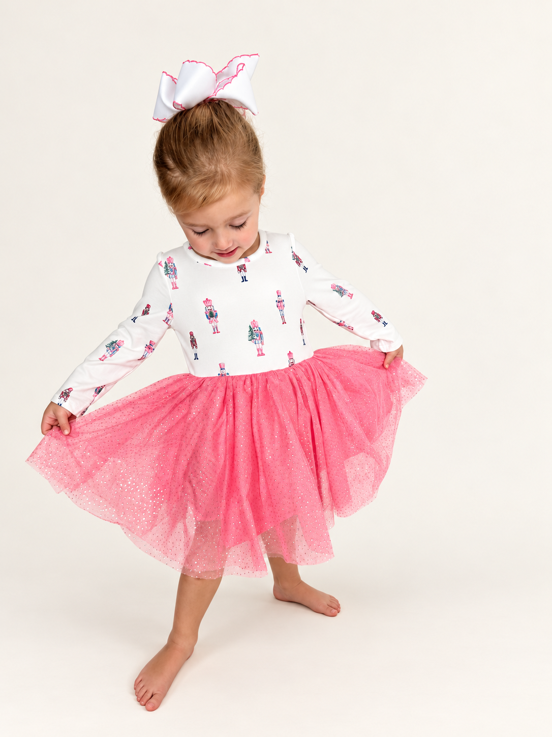 Girl twirling in The Nutcracker Twirl Dress