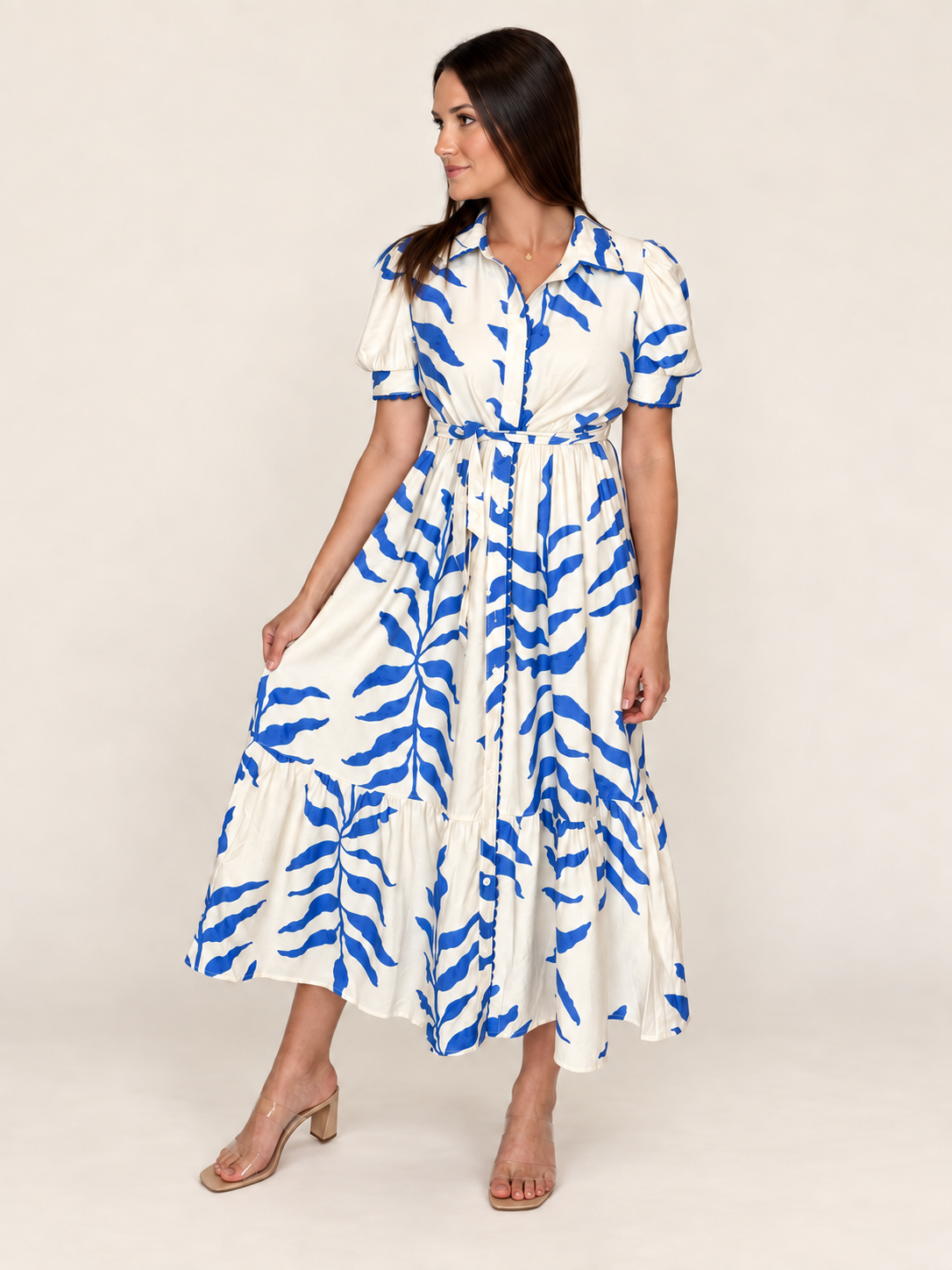 Woman in The Charleston Dress holding the skirt, three-quarter view