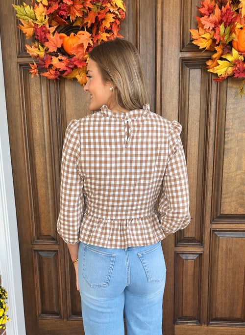 Back view of The Clara Gingham Top with puff sleeves