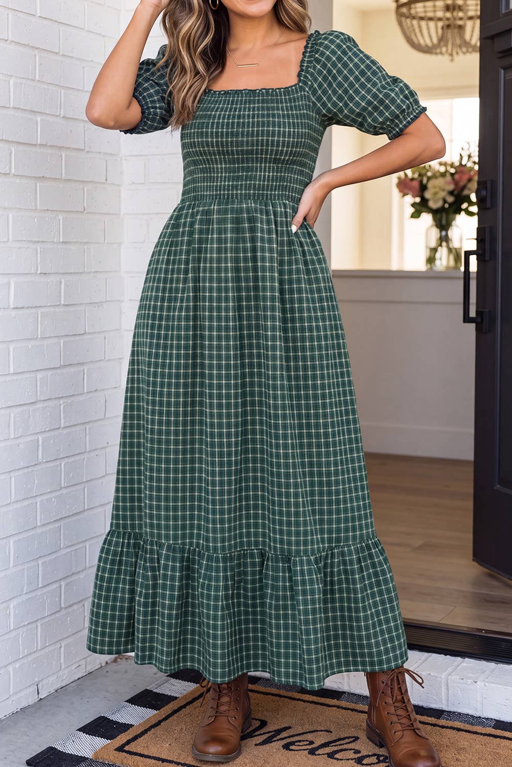 Woman in The Everly Plaid Dress with hands on waist